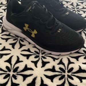 Under Armour Black Sneakers with Gold Logo